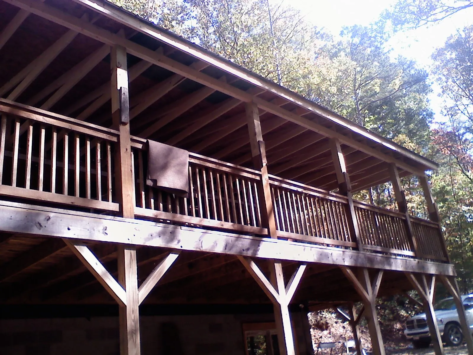 Timber framing under a new elevated porch and deck — Roof Leak Repair in Gill by Roofing Brothers